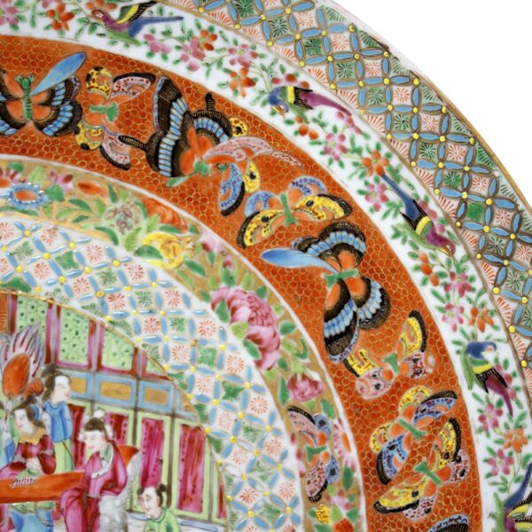 A close up of a Chinese porcelain famille rose charger.
