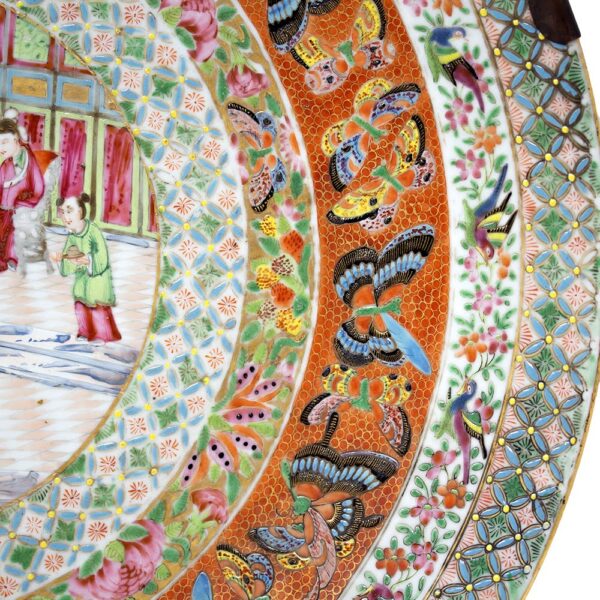A close up of a Chinese porcelain famille rose charger.