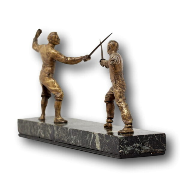 Side profile of the French fencing bronze figure