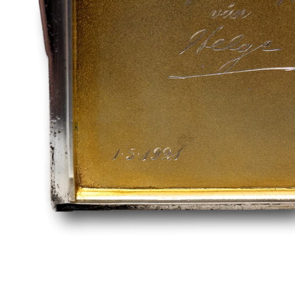 Close up of the inscription date on the Prince Axel Cigarette Case
