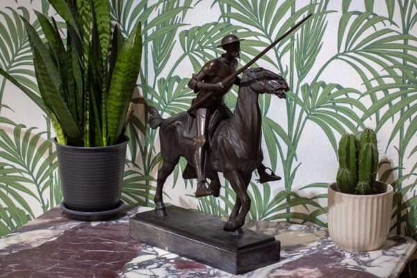 German Don Quioxte bronze in a decorative collectors setting for scale.