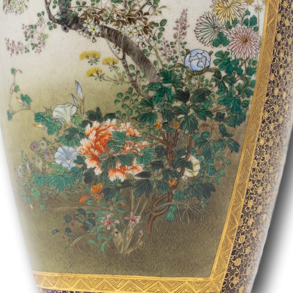 Close up of the scenes on the Japanese Meiji Period Satsuma vase by kinkozan