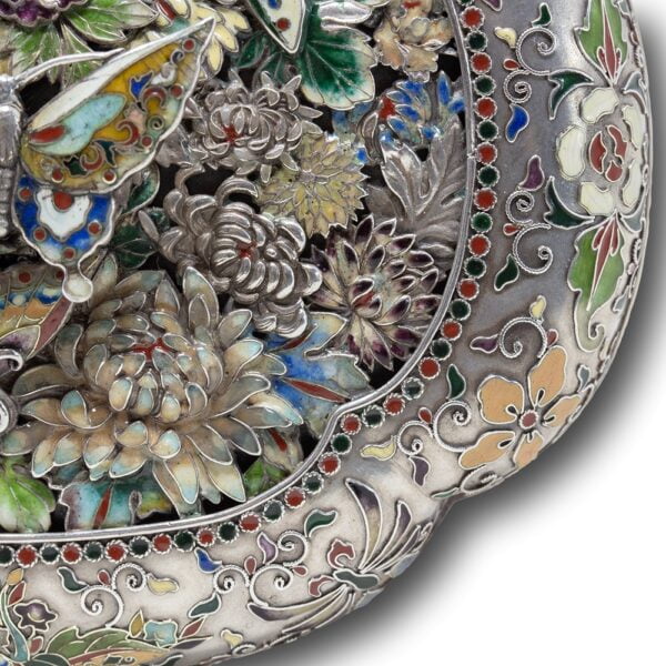 Close up of the top of the Japanese silver and enamel box