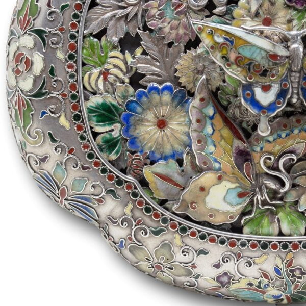 Close up of the top of the Japanese silver and enamel box