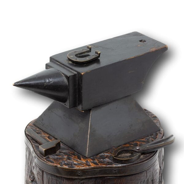 Close up of the Black Forest Blacksmiths Anvil on the top of the Tobacco Jar Smokers Compendium