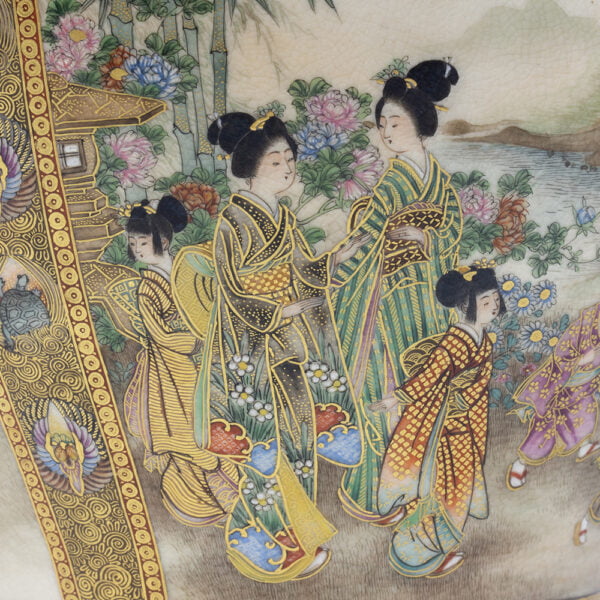 Close up two Geisha's with their children in one scene